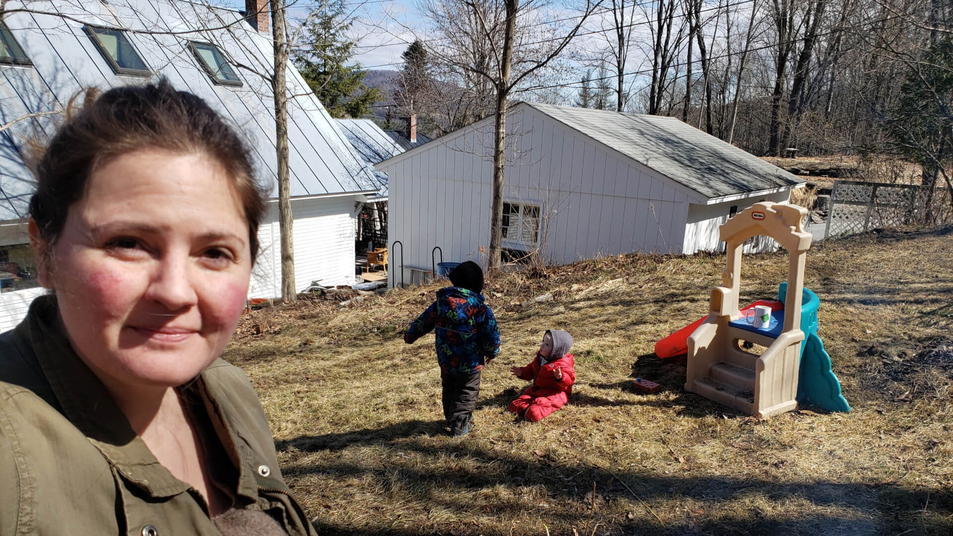 Laura White and her kids enjoying spring outside