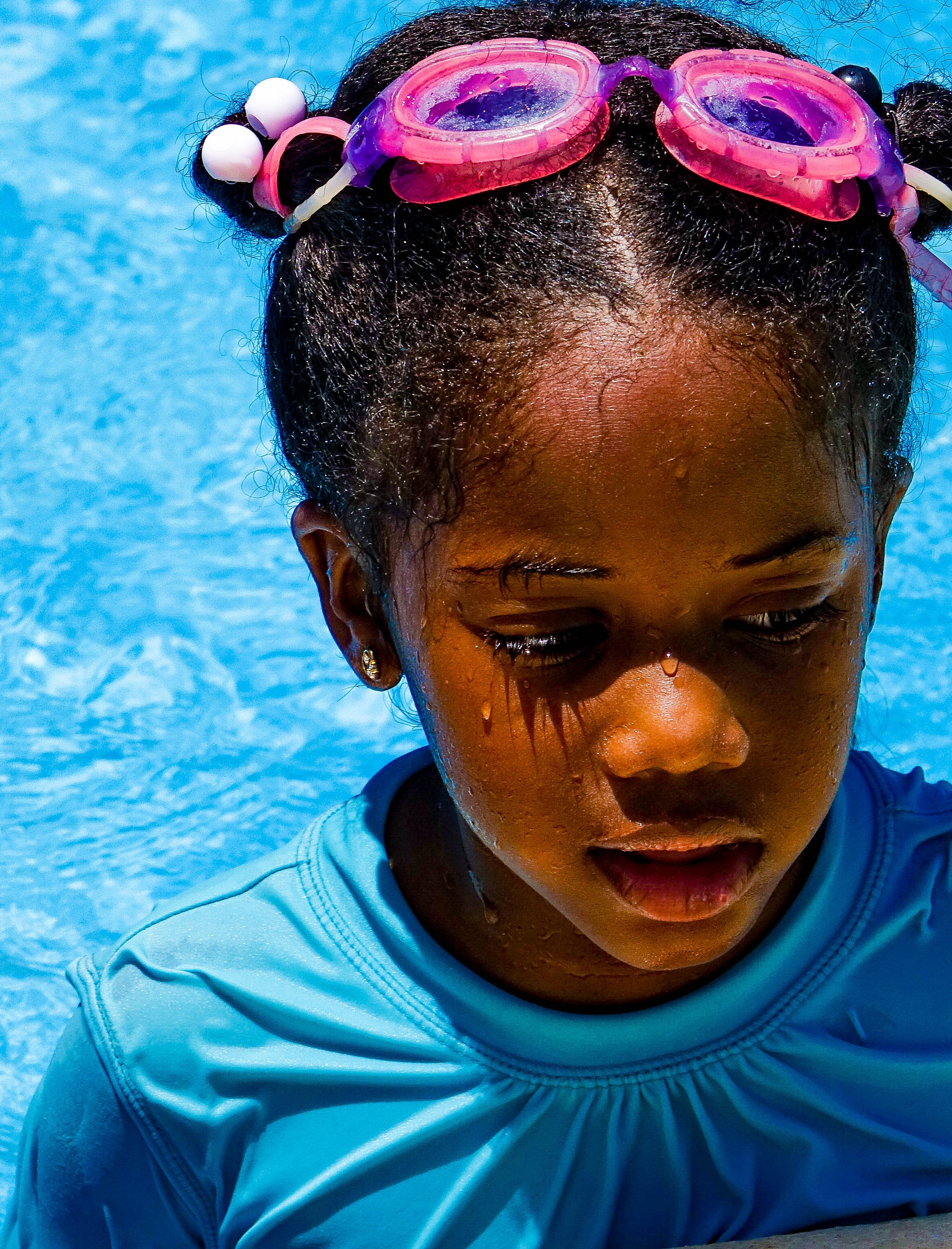 Child swimming in the pool