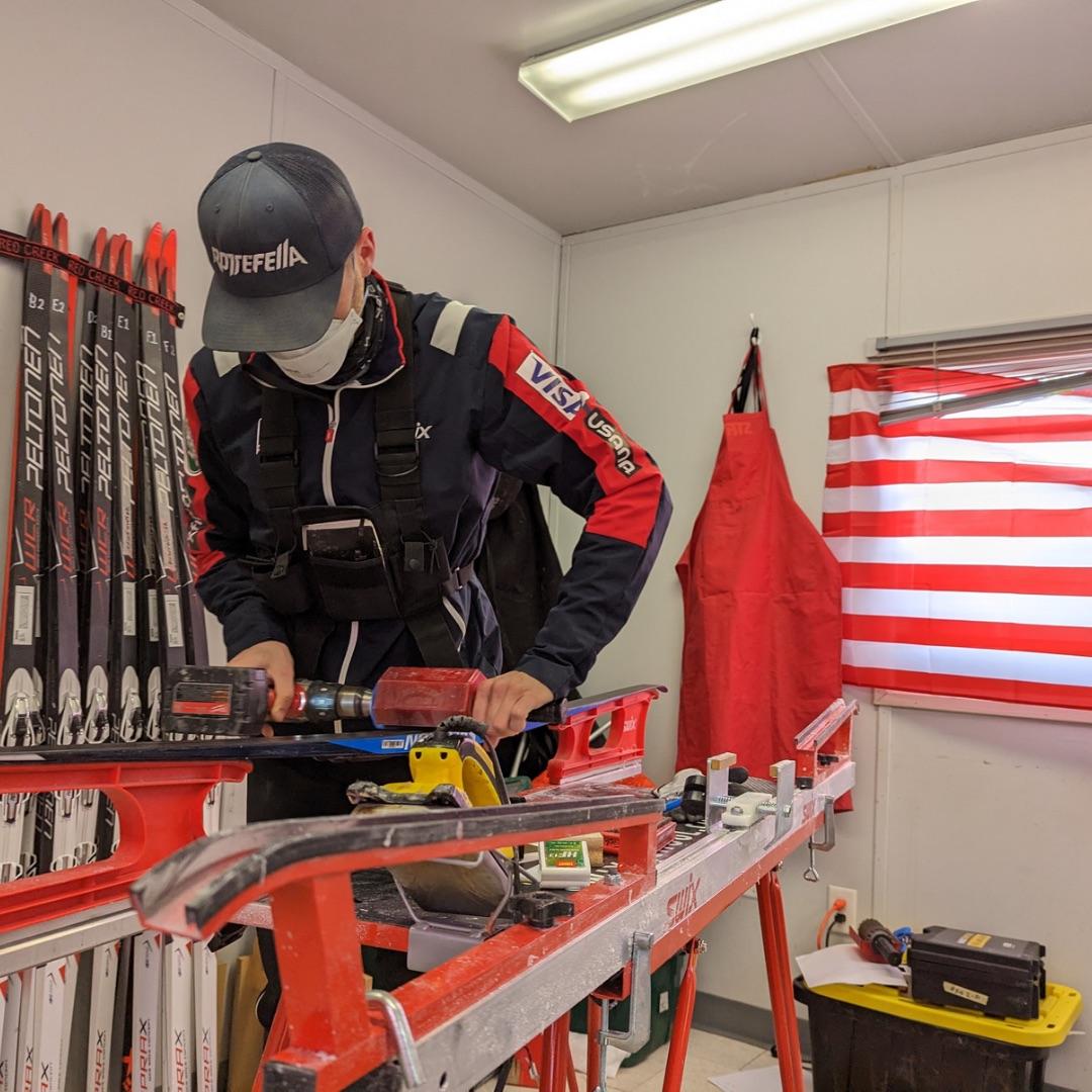 Jacob Huseby working on a pair of ski's