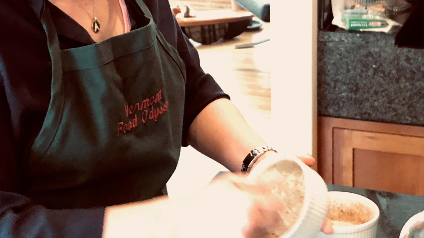 Preparing ramekins for Odyssey Events soufflé cooking class