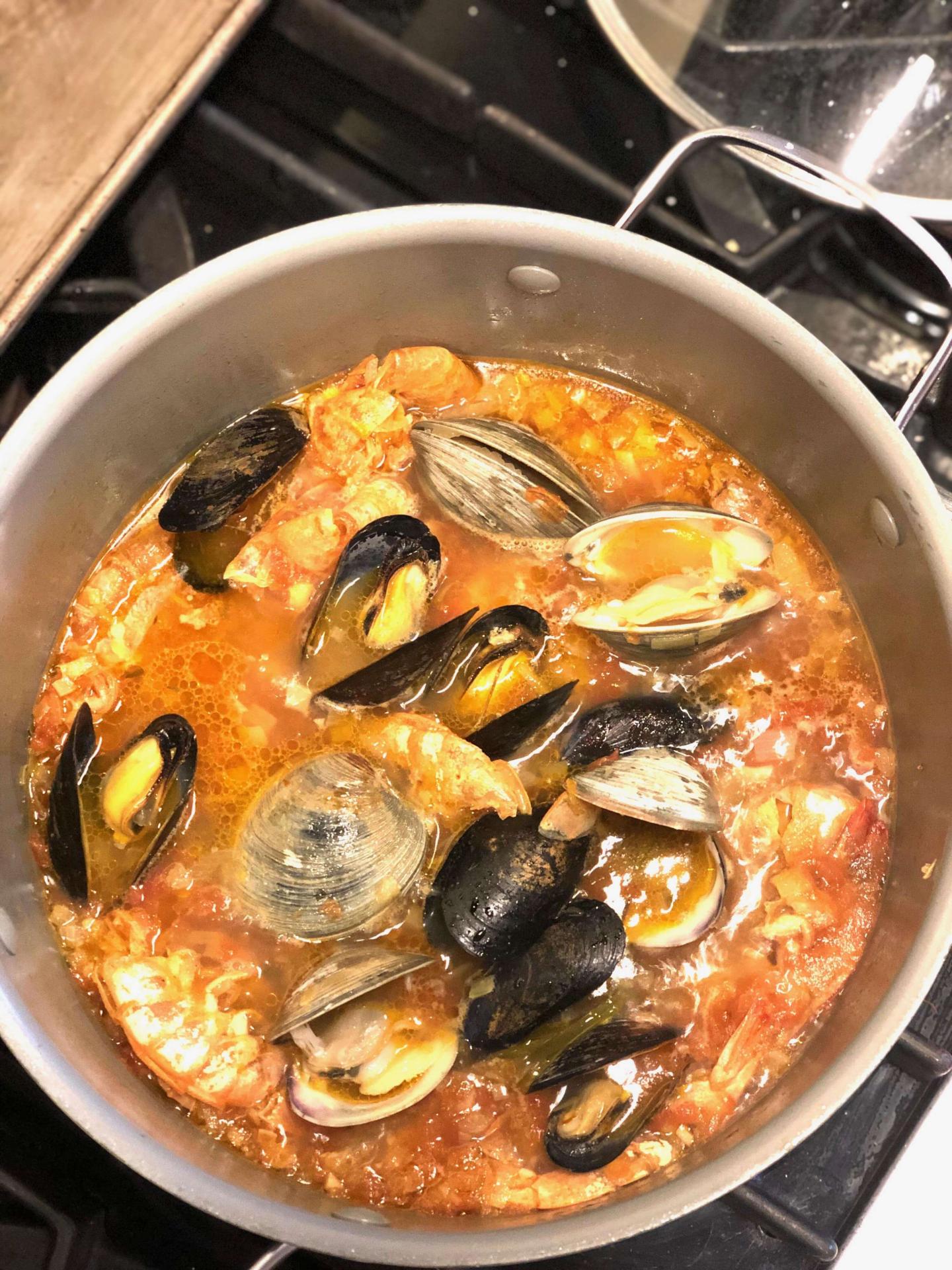 Simmering bouillabaisse or fish stew at Odyssey Events cooking class