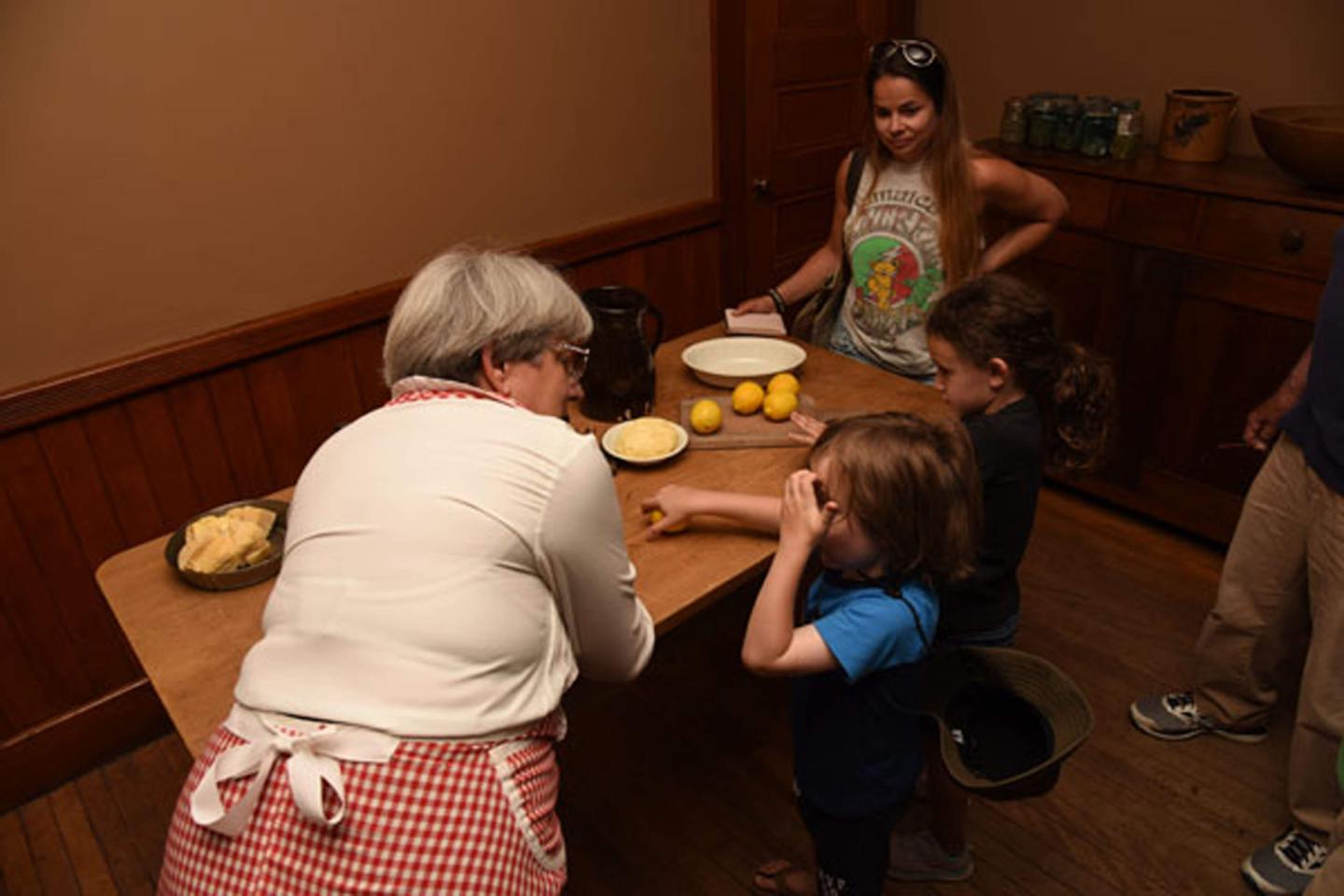 Children learning to cook.