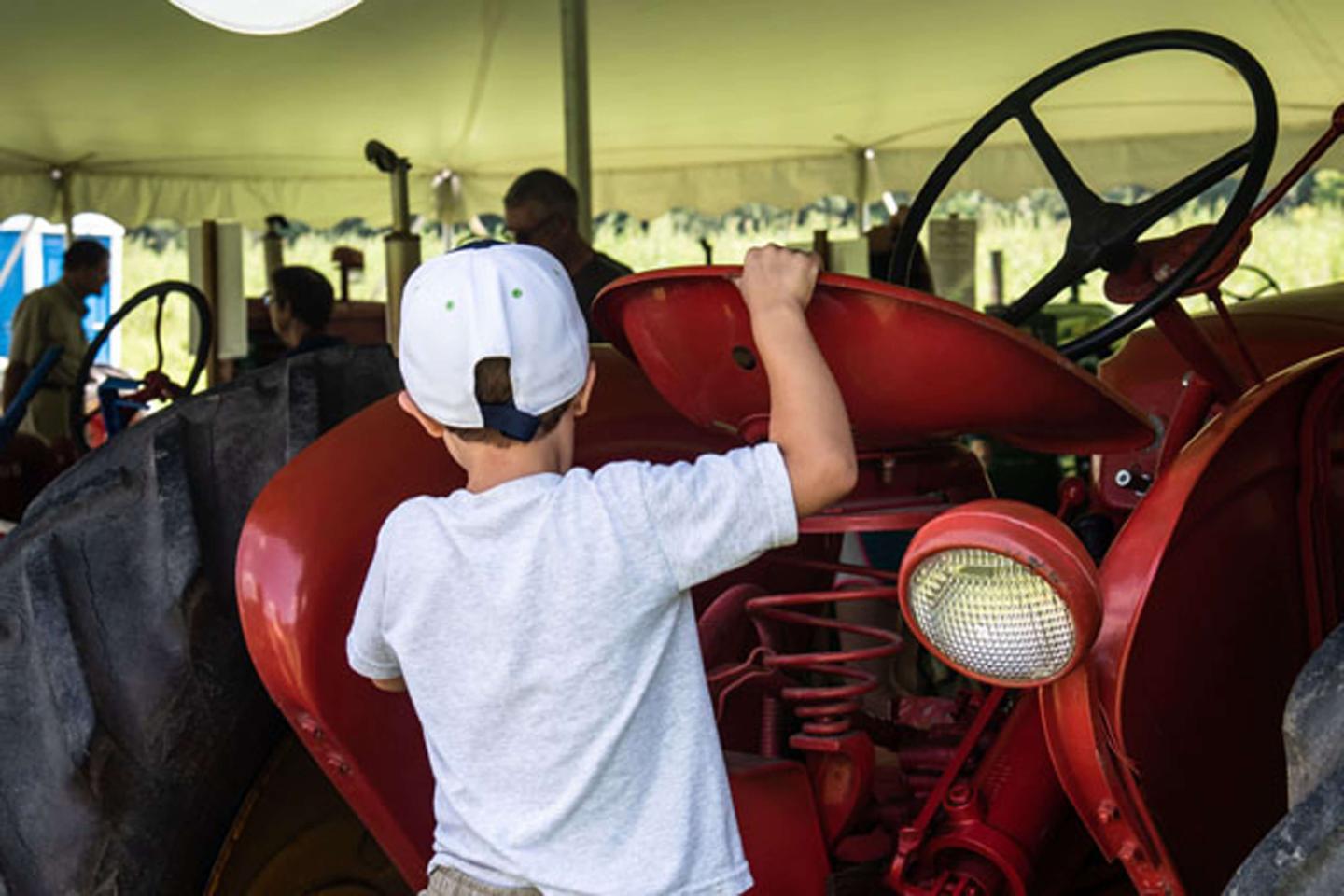 Children experimenting with tractors.