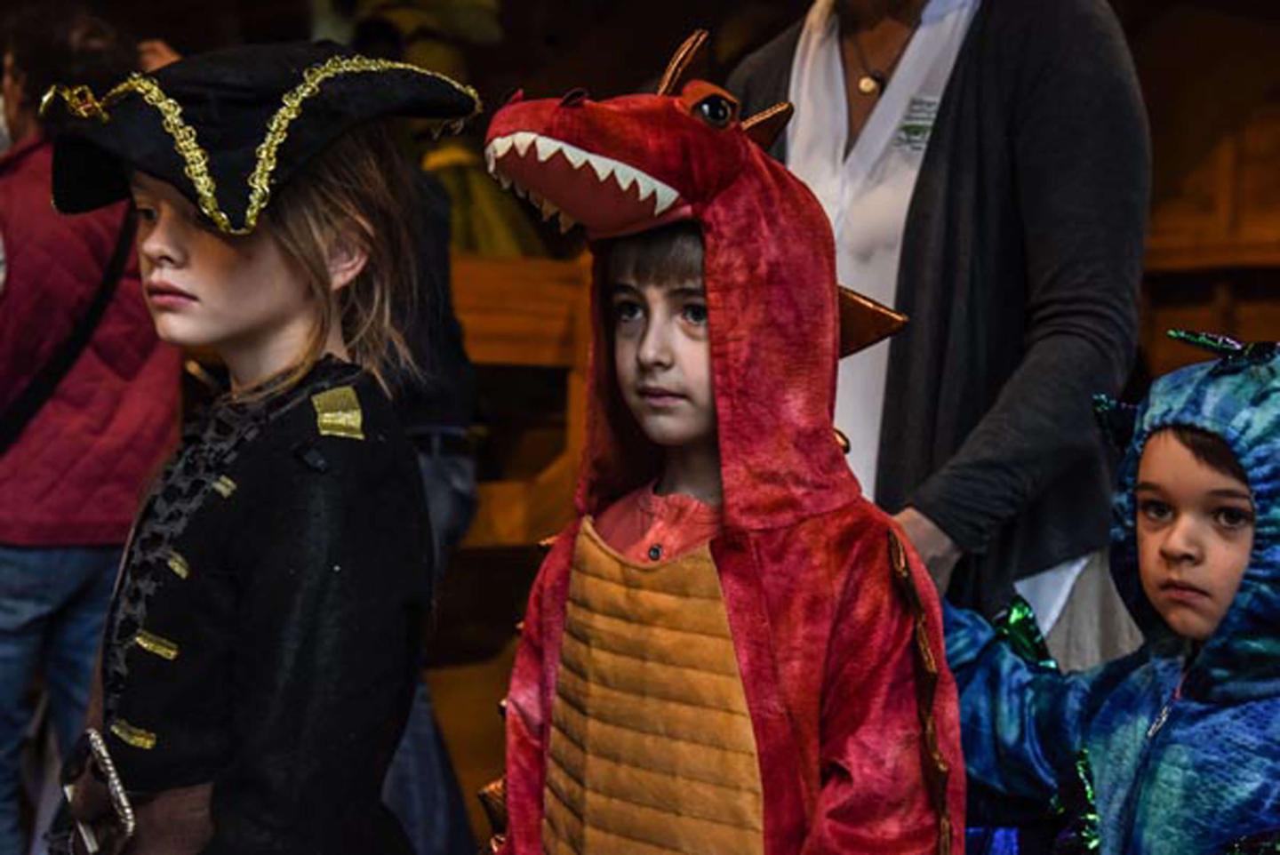 Children dressed in costume, ready for parade.