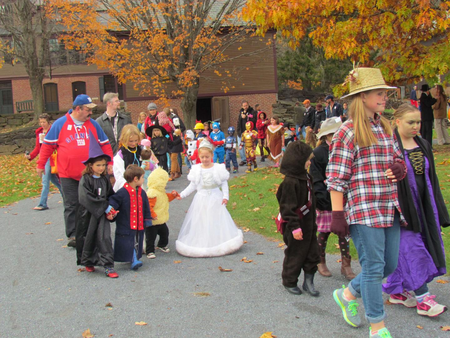Guests participating in Halloween costume parade.