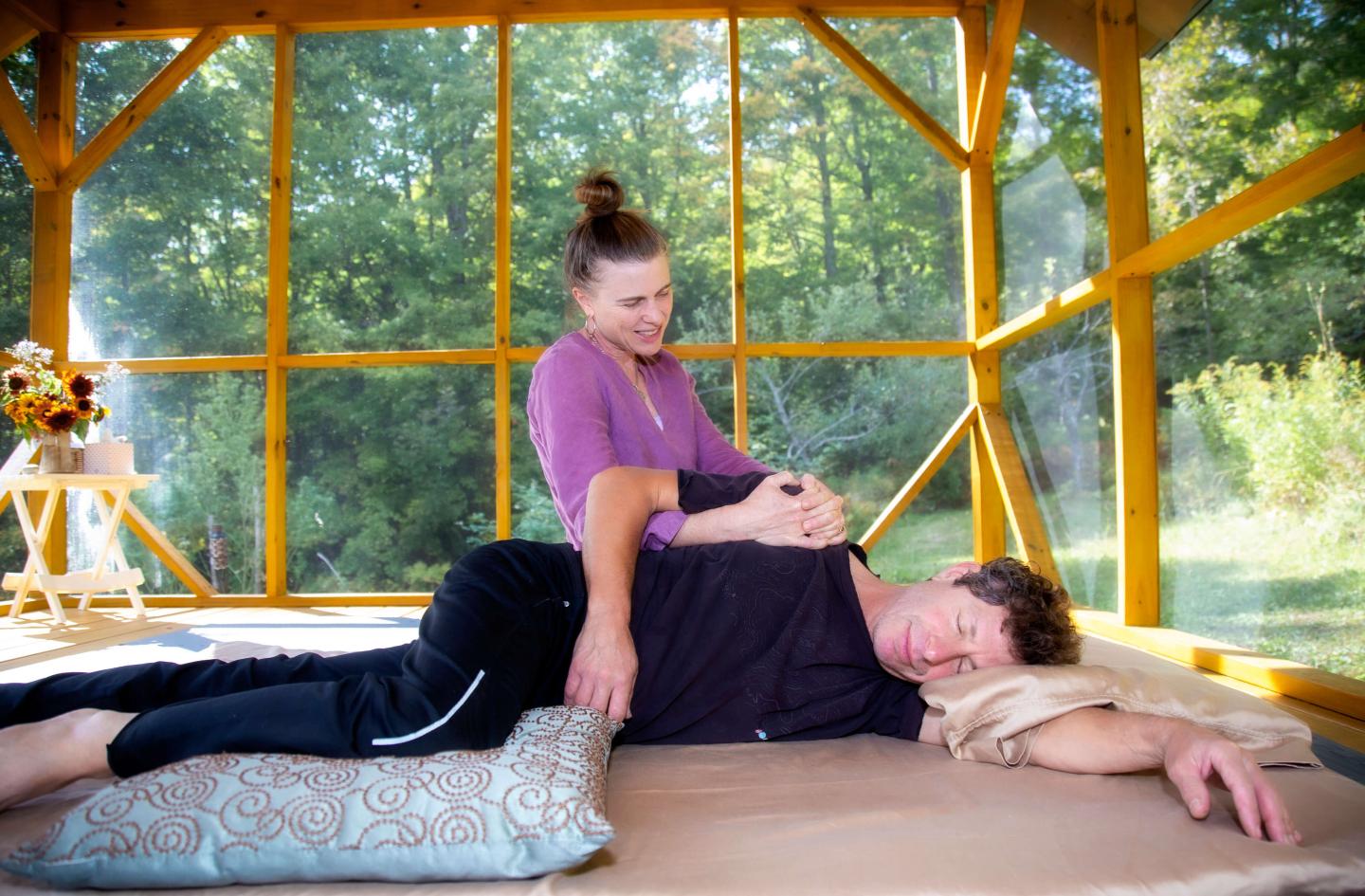 Outdoor Thai Yoga Massage on a mat