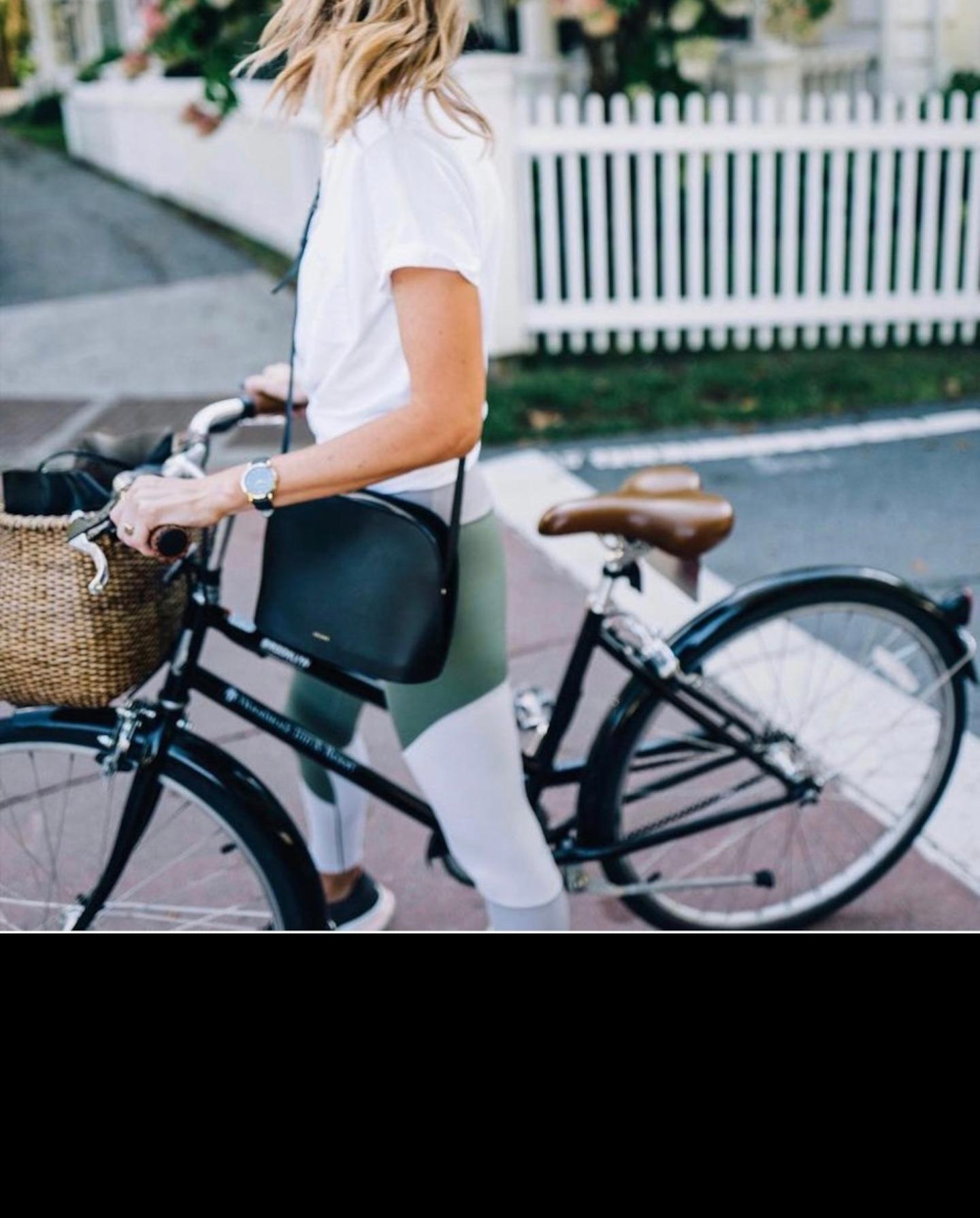 Jess Ann biking through town