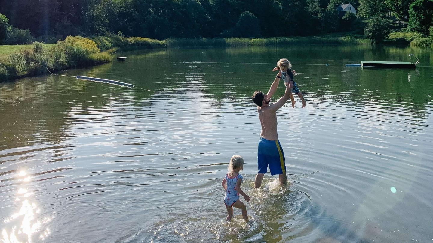 family at kedron pond