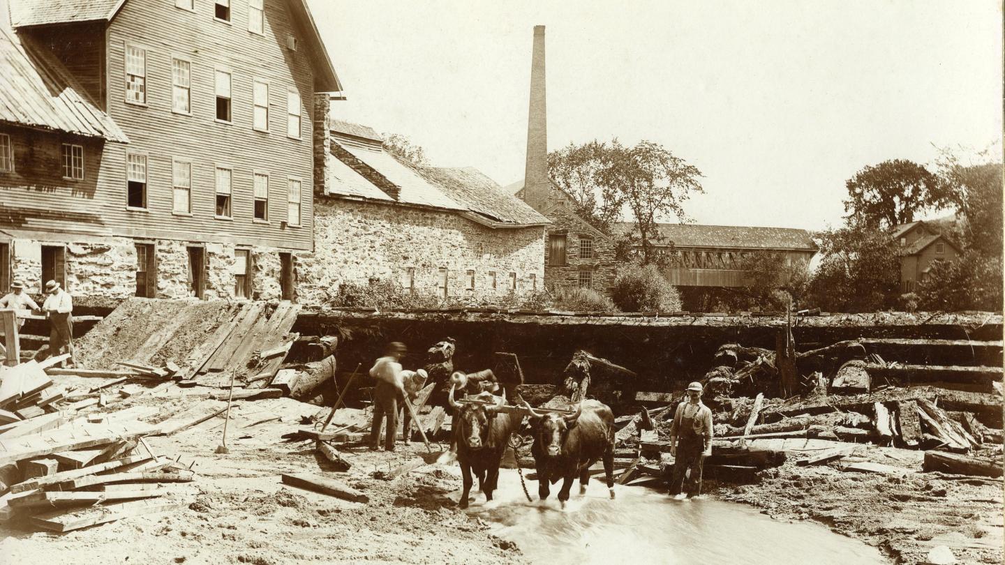 Fixing the dam by the old woolen mill.