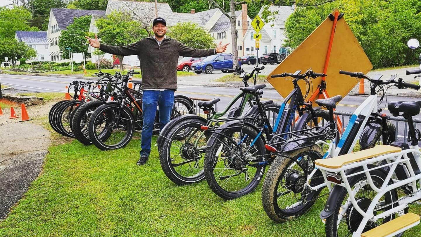 Owner Luke in front of his fleet