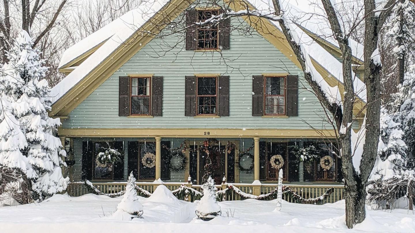 Crystal and Bark designs woodstock village home in winter snow