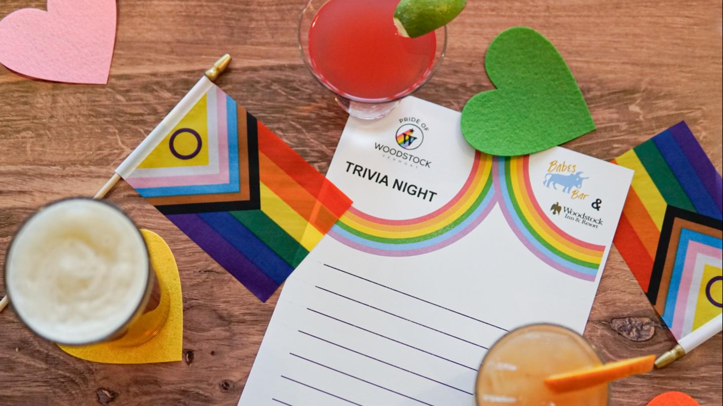 Trivia Night card with pride flags and cocktails