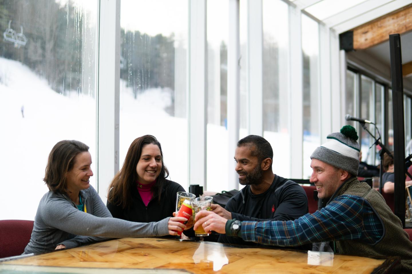 Group of friends relaxing at Saskadena Six after skiing