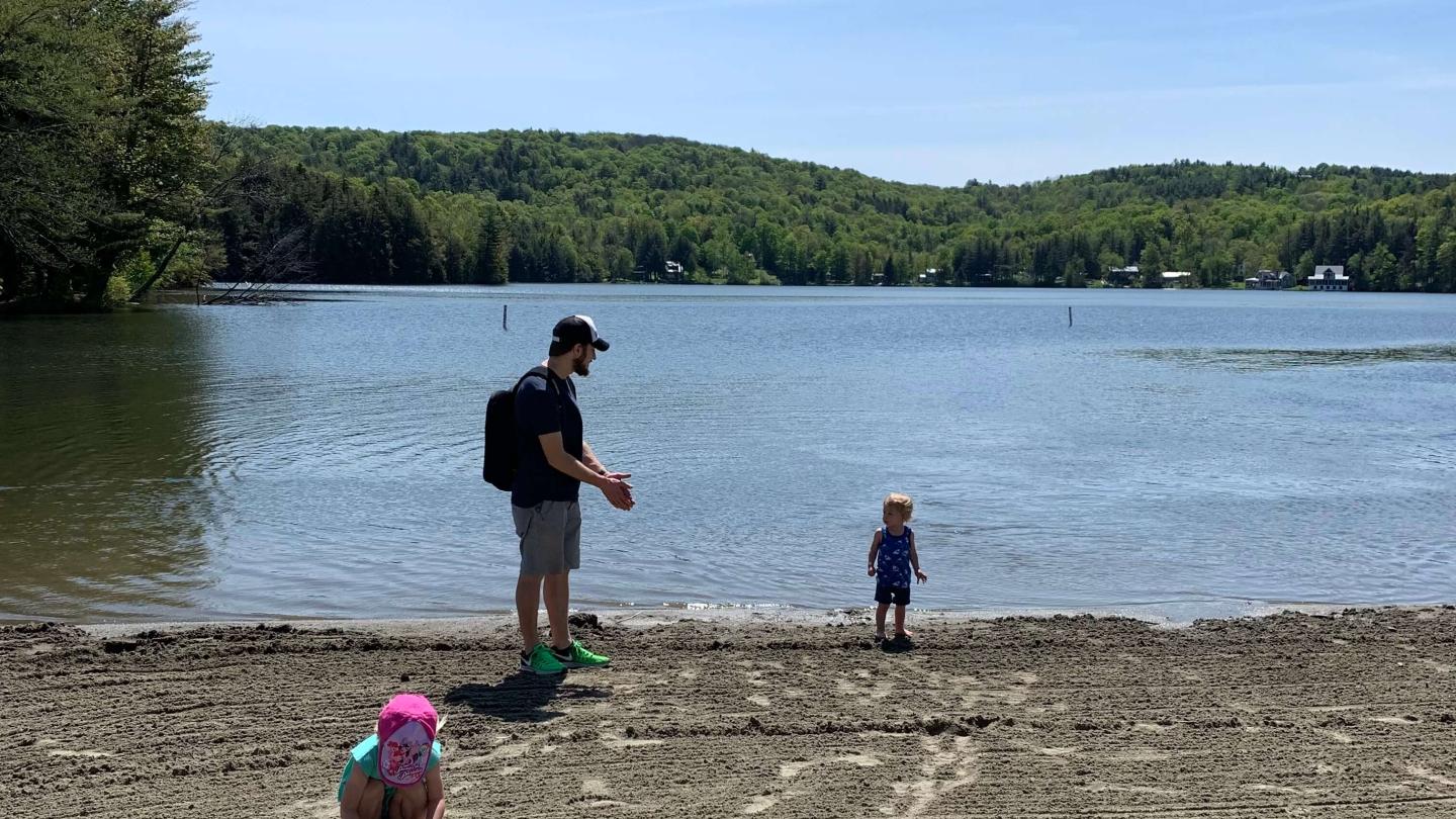 family on the beach at silver lake