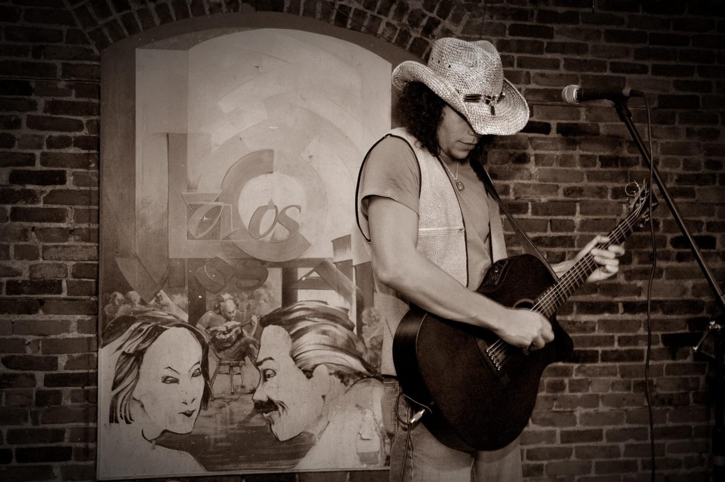 Tony Lee Thomas playing guitar