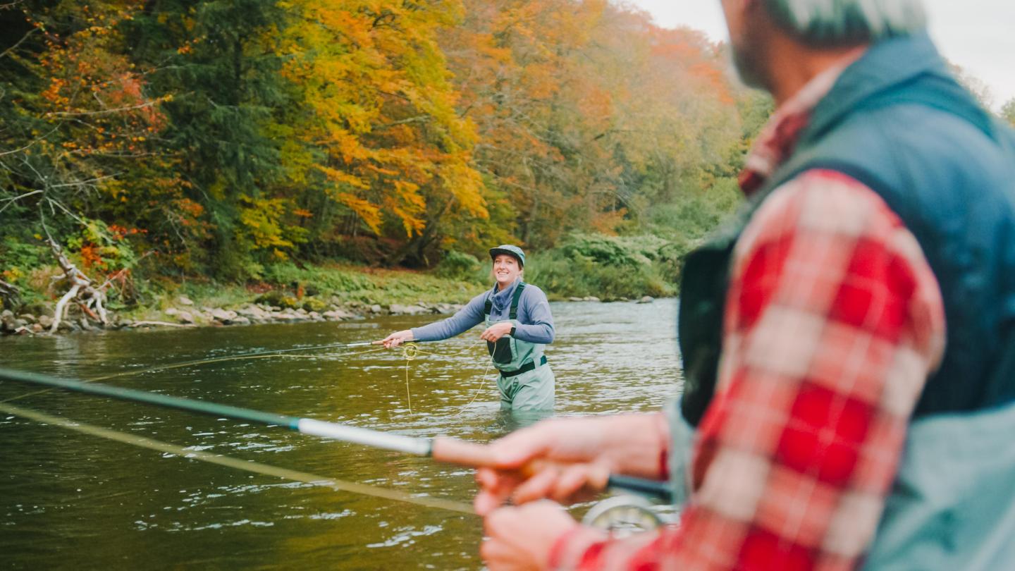 Woman Fly Fishing in Vermont