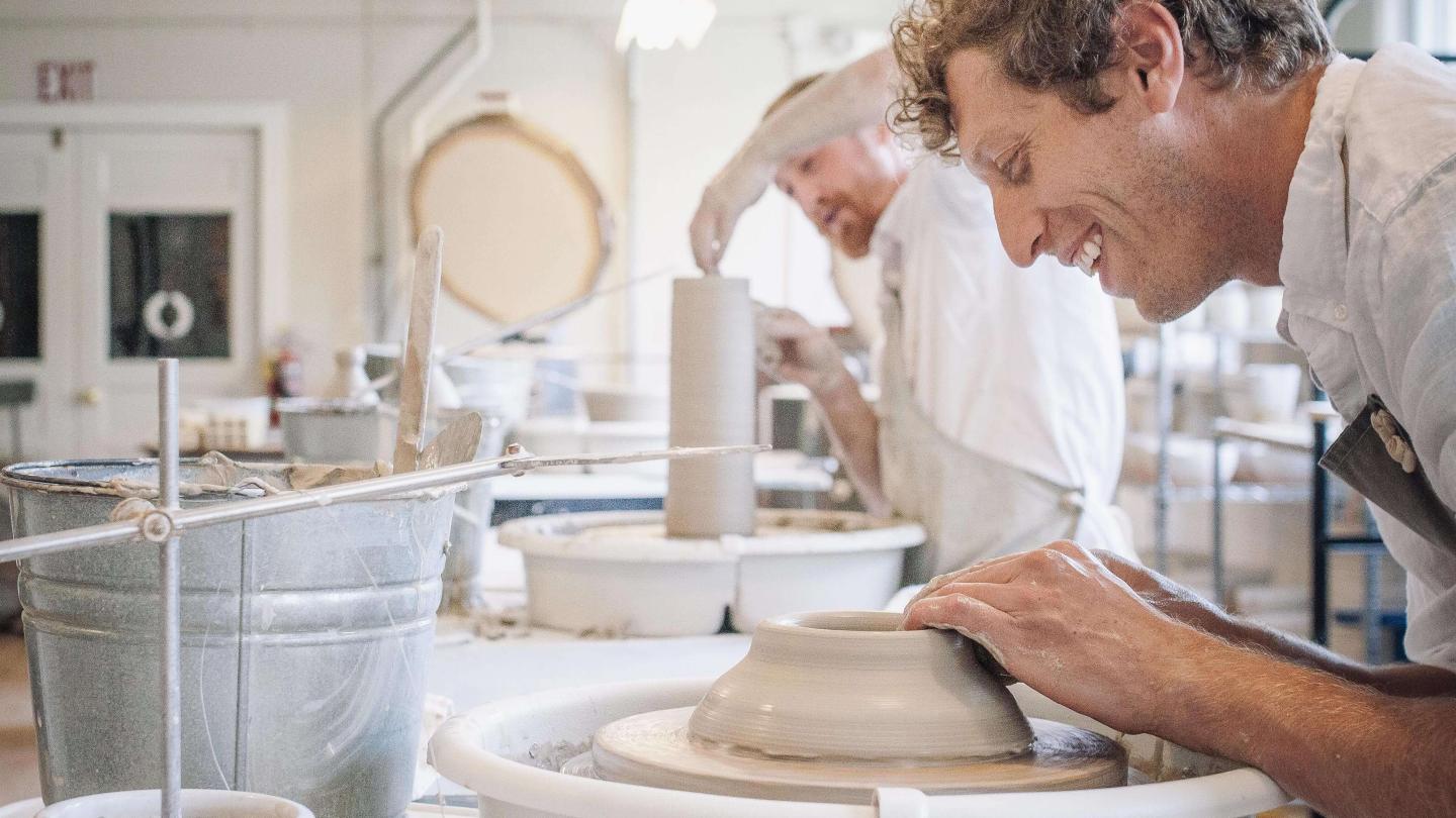 James Zilian of Farmhouse Pottery at the pottery wheel