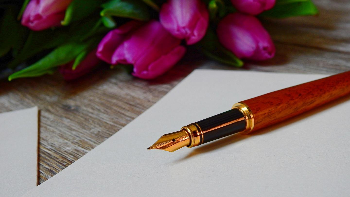 writing paper pen flowers