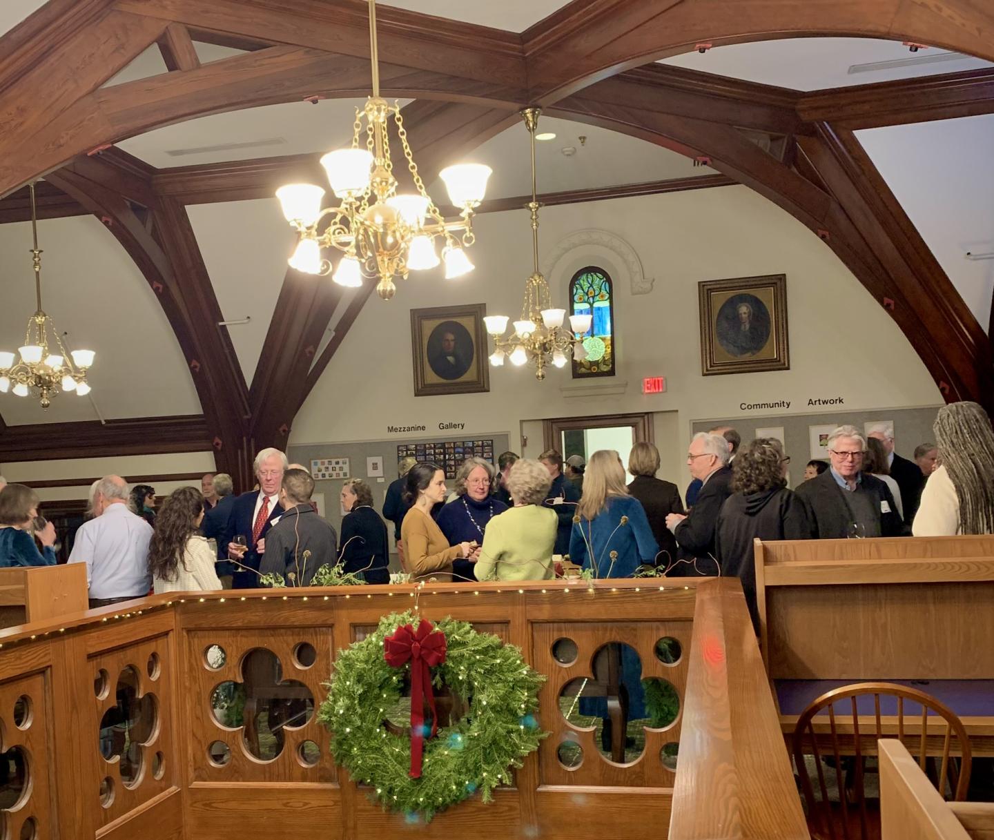 Gathering on the library mezzanine to celebrate Wassail