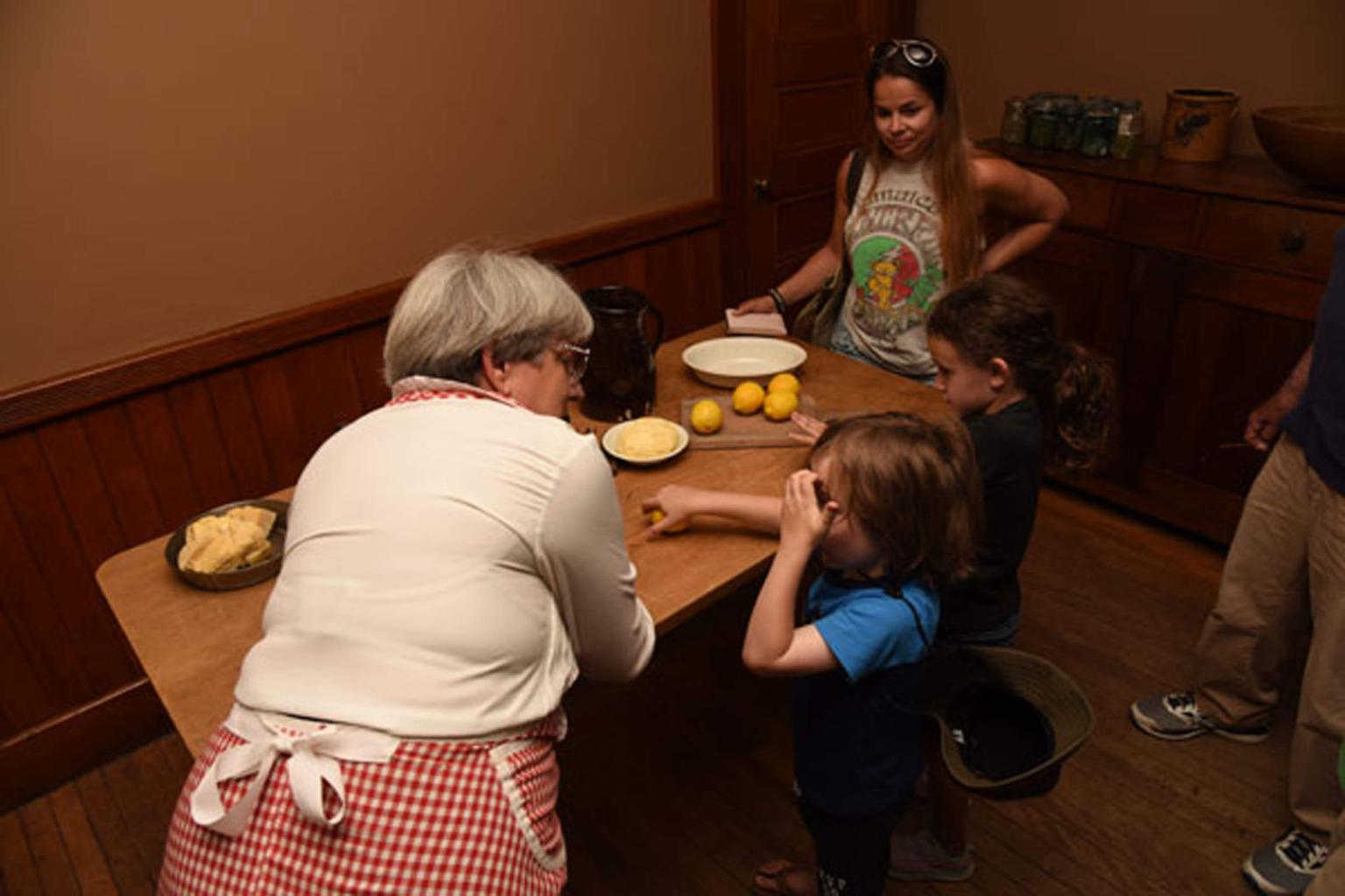 Children learning to cook.