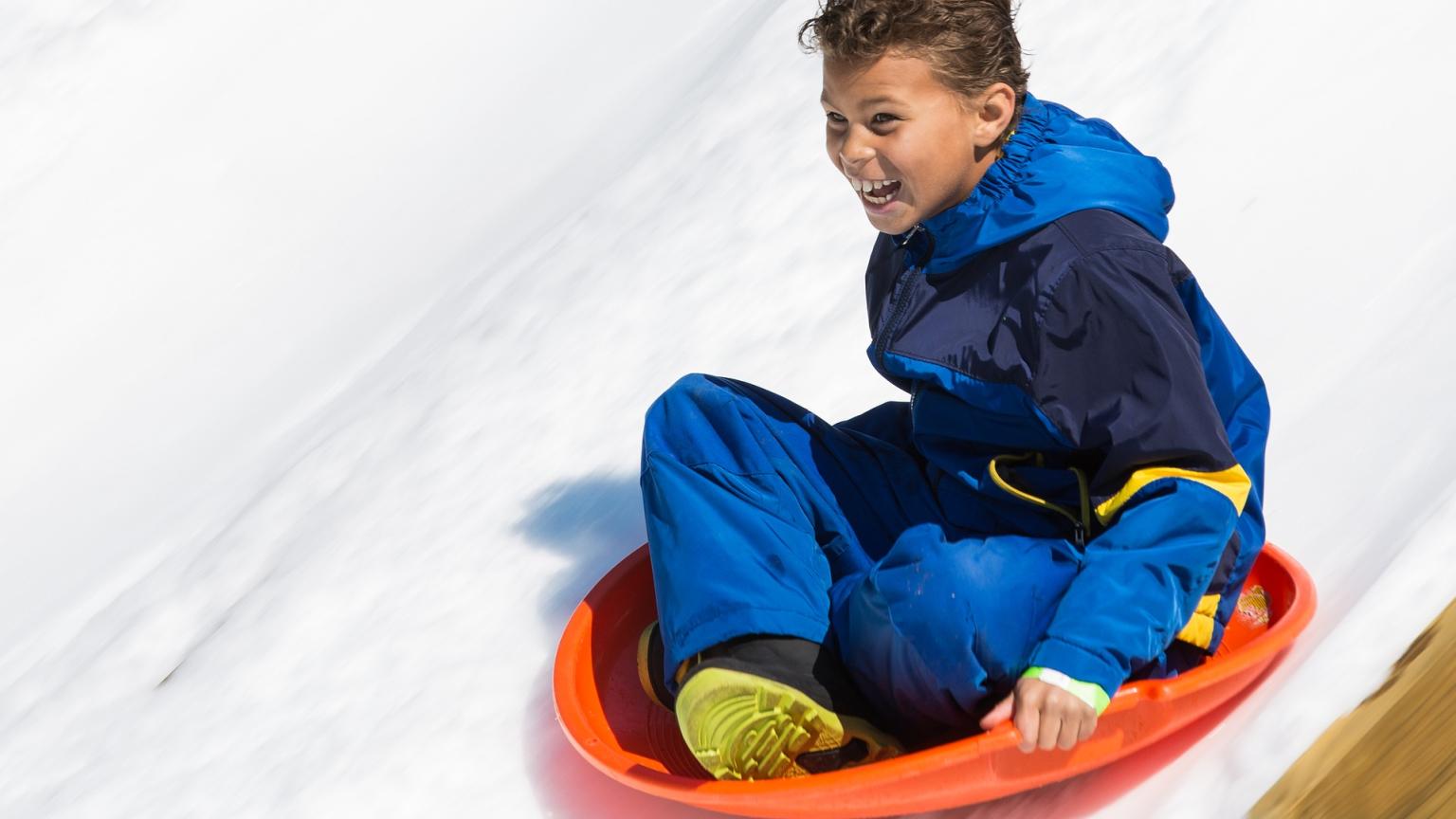 Sledding child