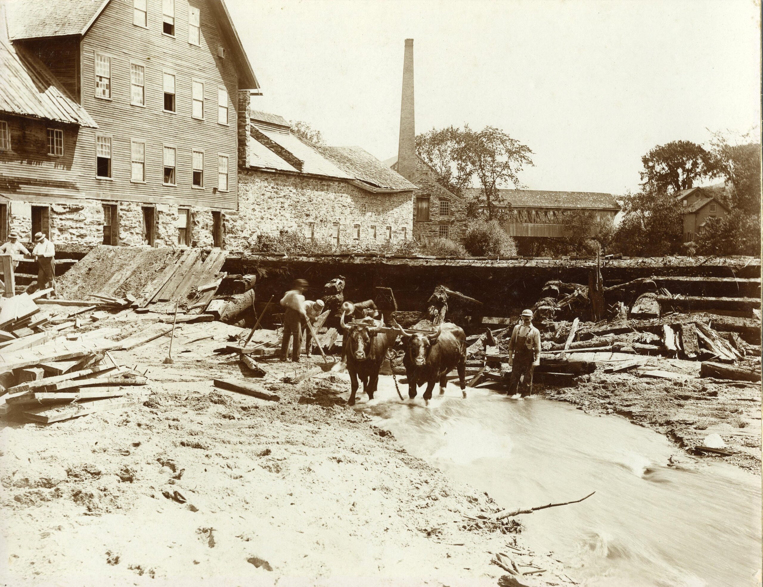 Fixing the dam by the old woolen mill.