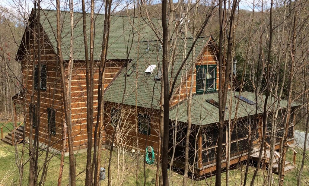View of house from the back; screened porch