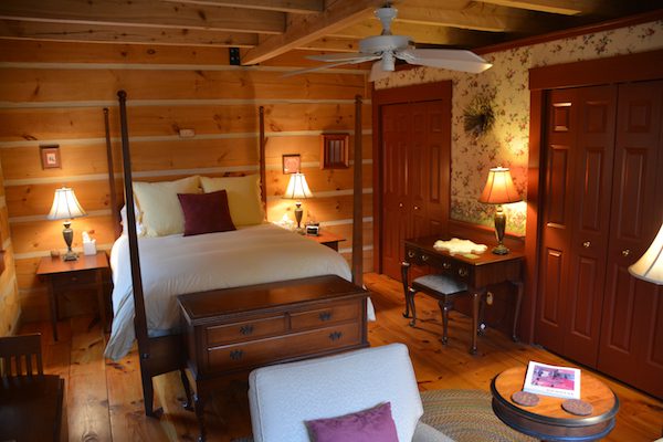 East upstairs bedroom has 4 windows, gas fireplace w/ thermostat