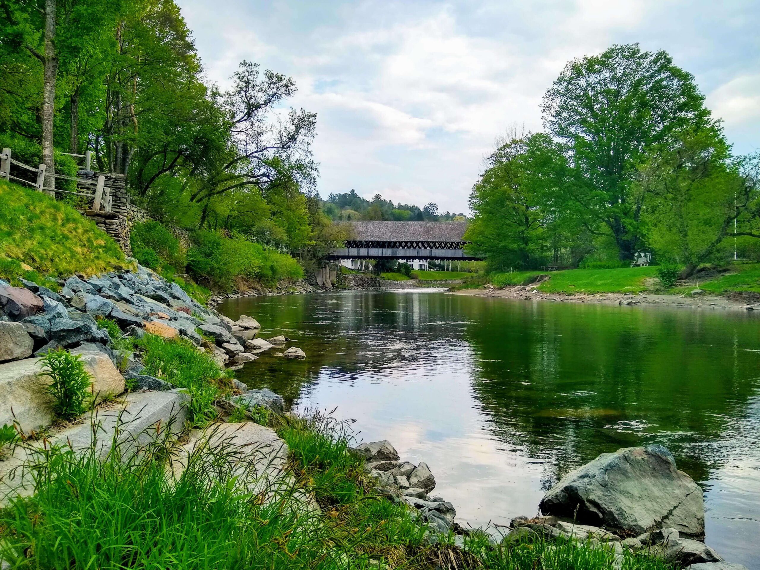 Back lawn of the Woodstock History Center, view of Middle Covered Bridge
