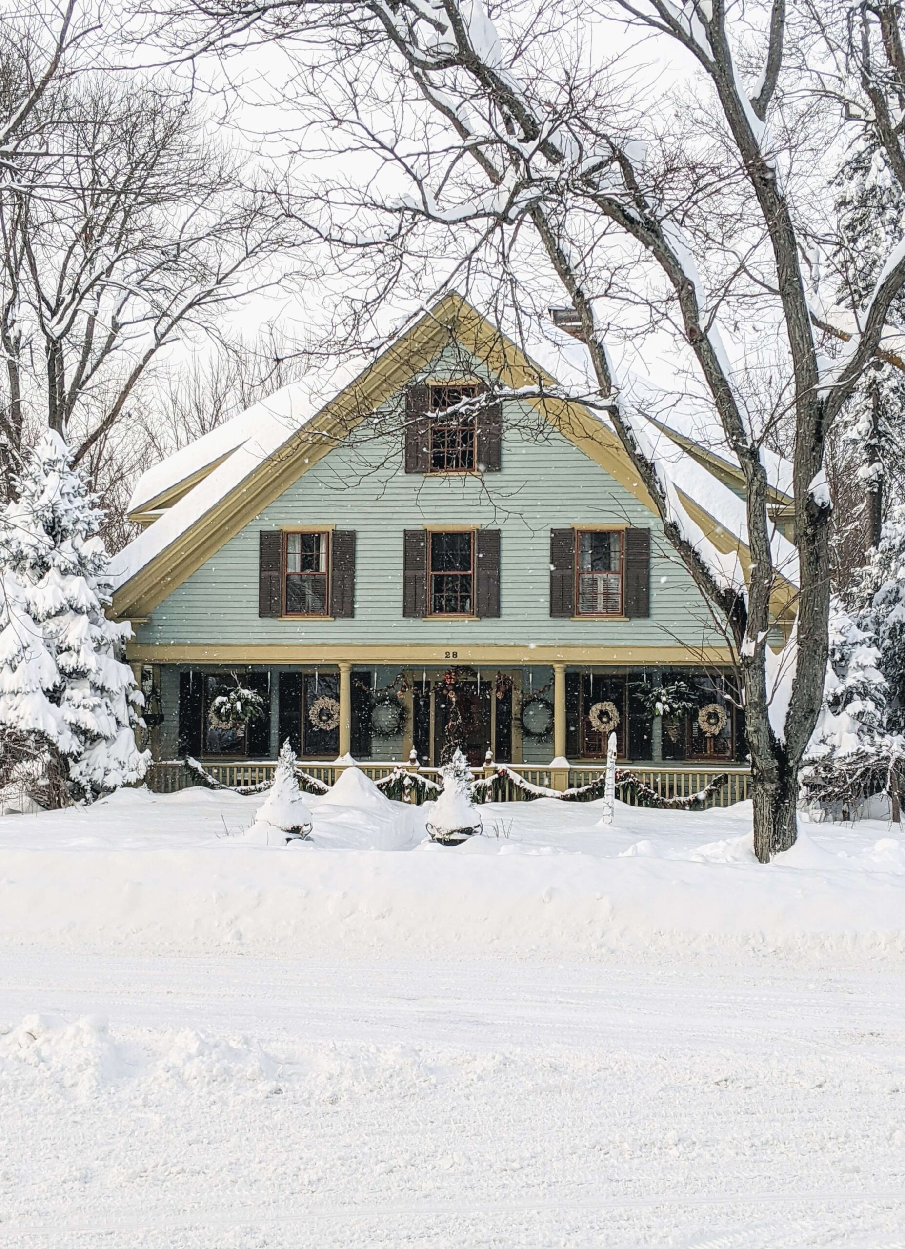 Crystal and Bark designs woodstock village home in winter snow
