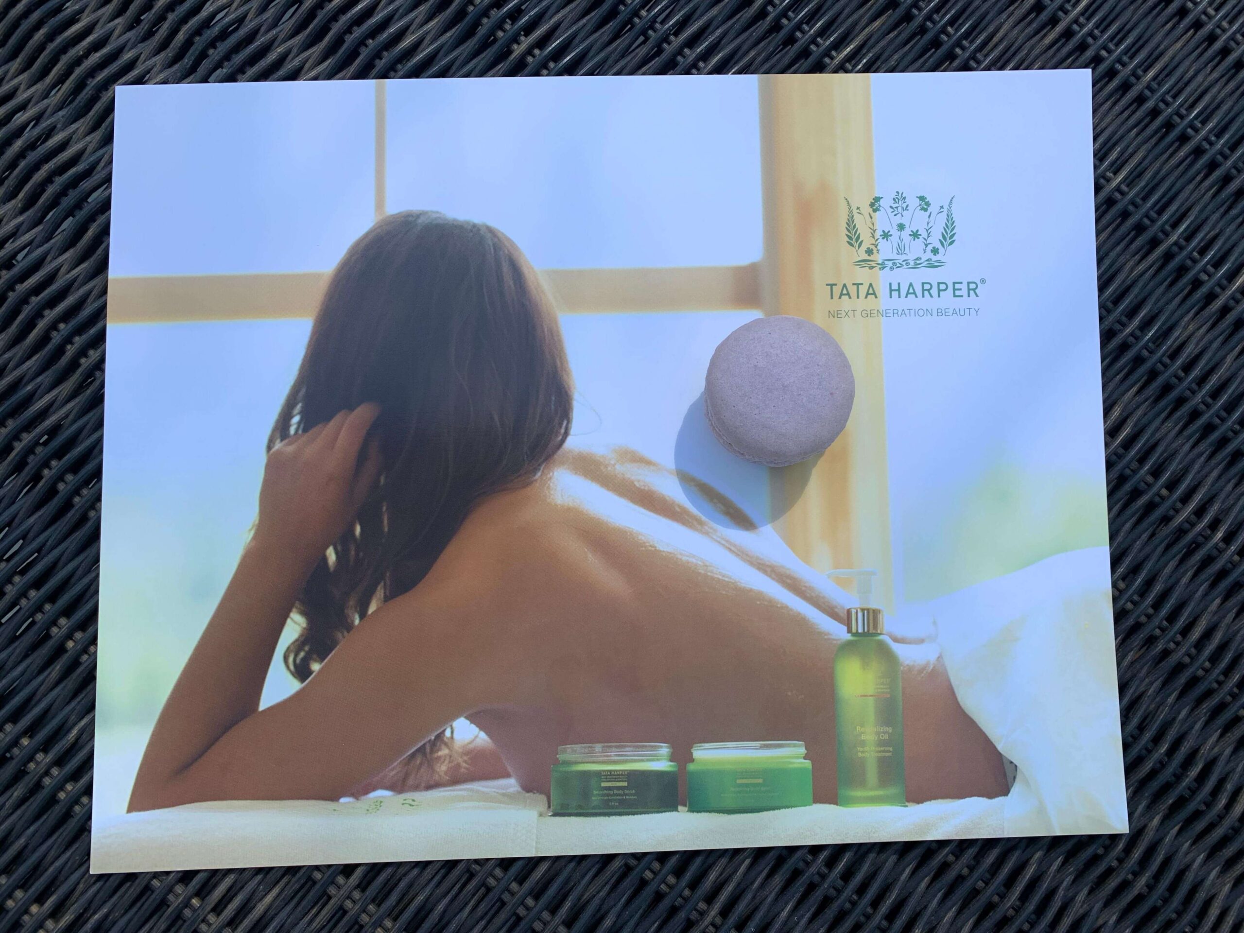 Tata Harper sheet with a macaron 