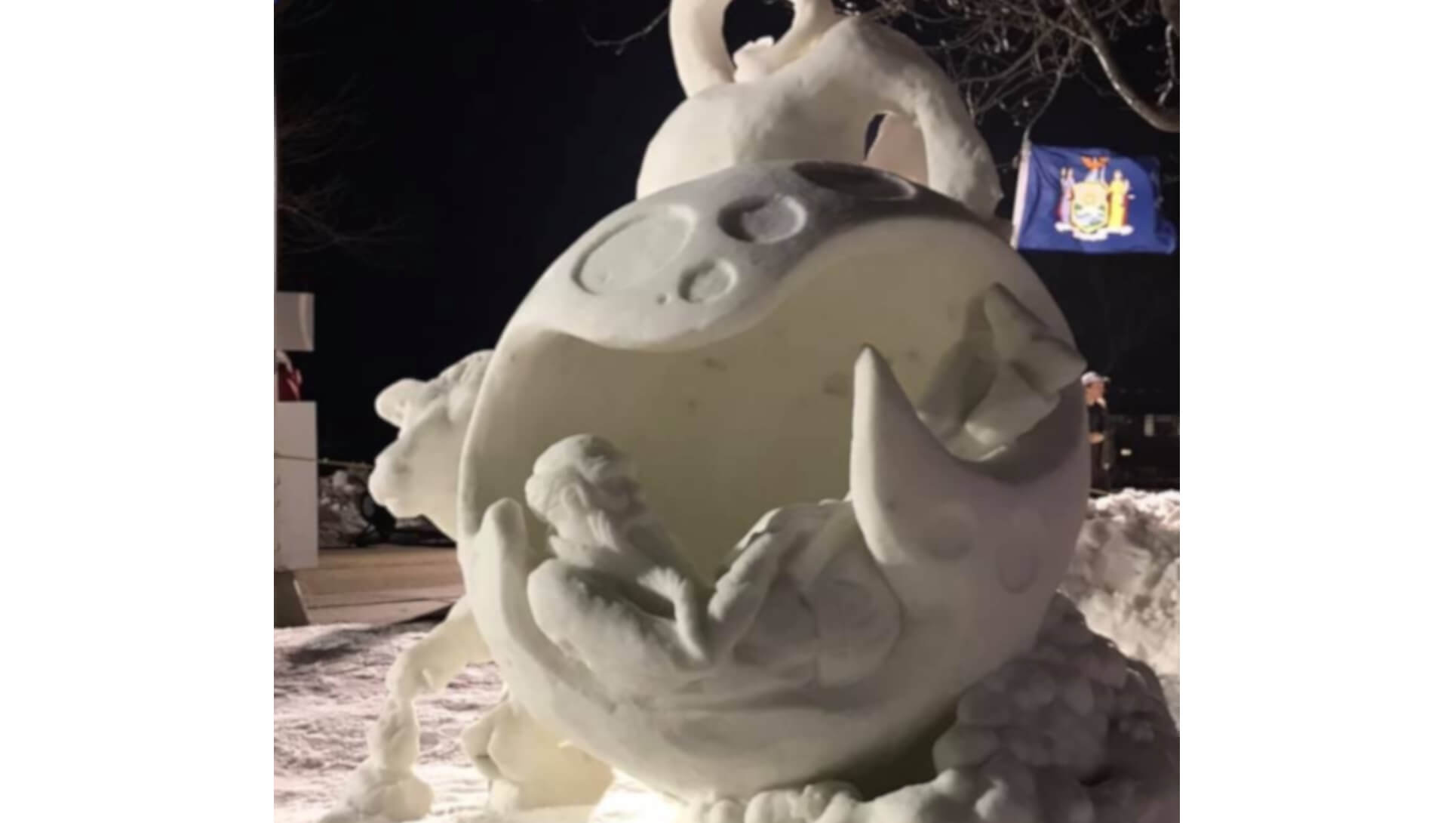 Snow sculpture cow moon back
