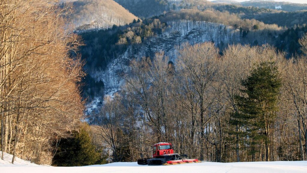 Groomer works on conditions at Suicide Six Ski Area