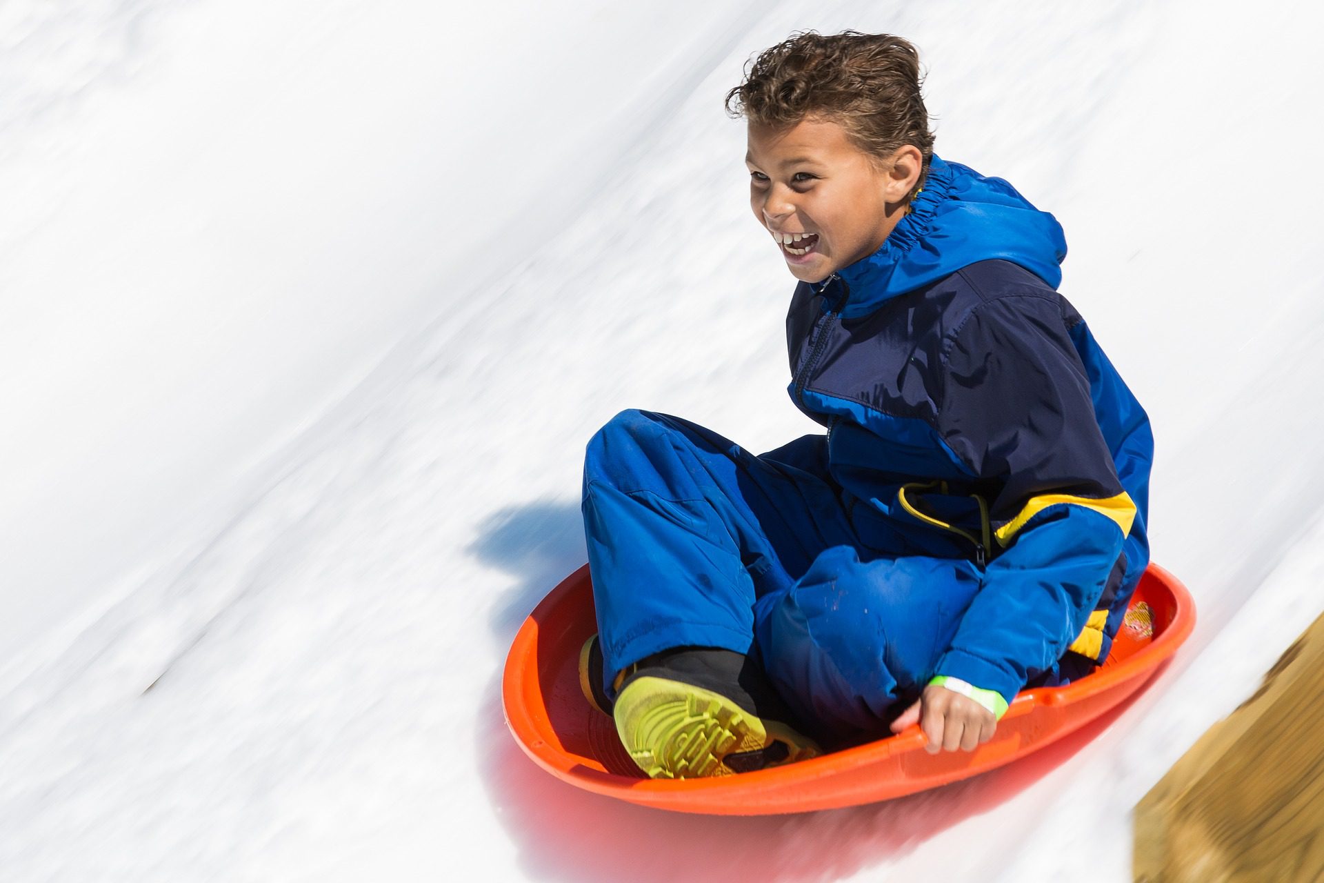 Sledding child