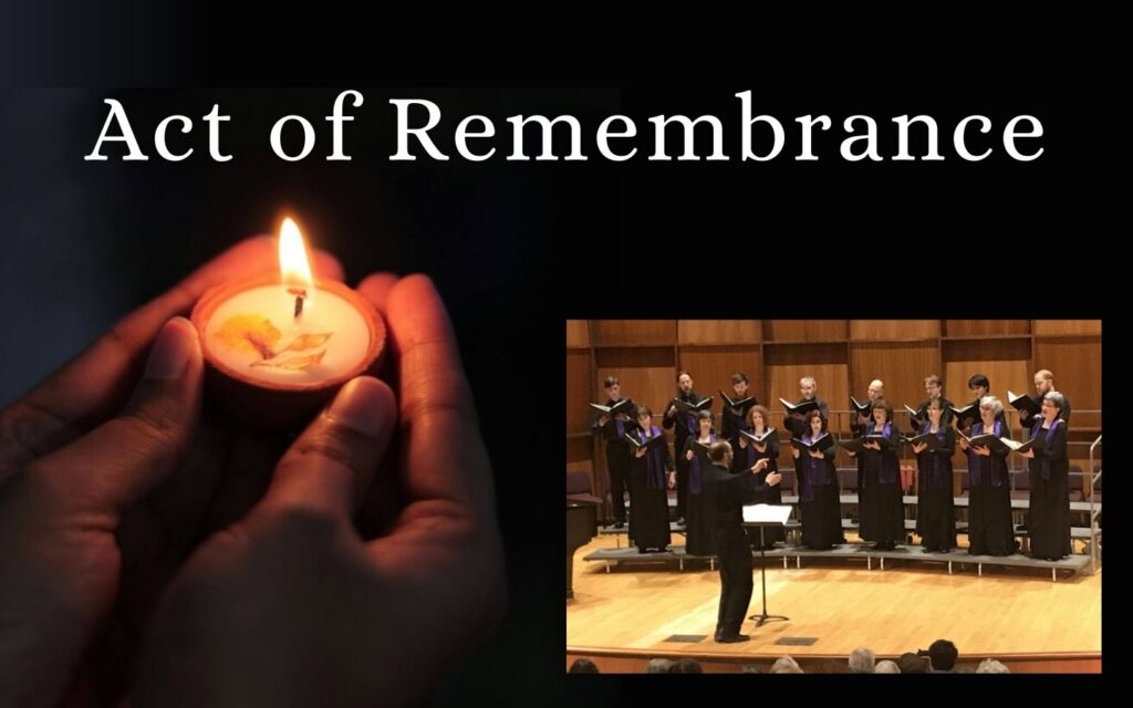 hand holding candle and picture of singers